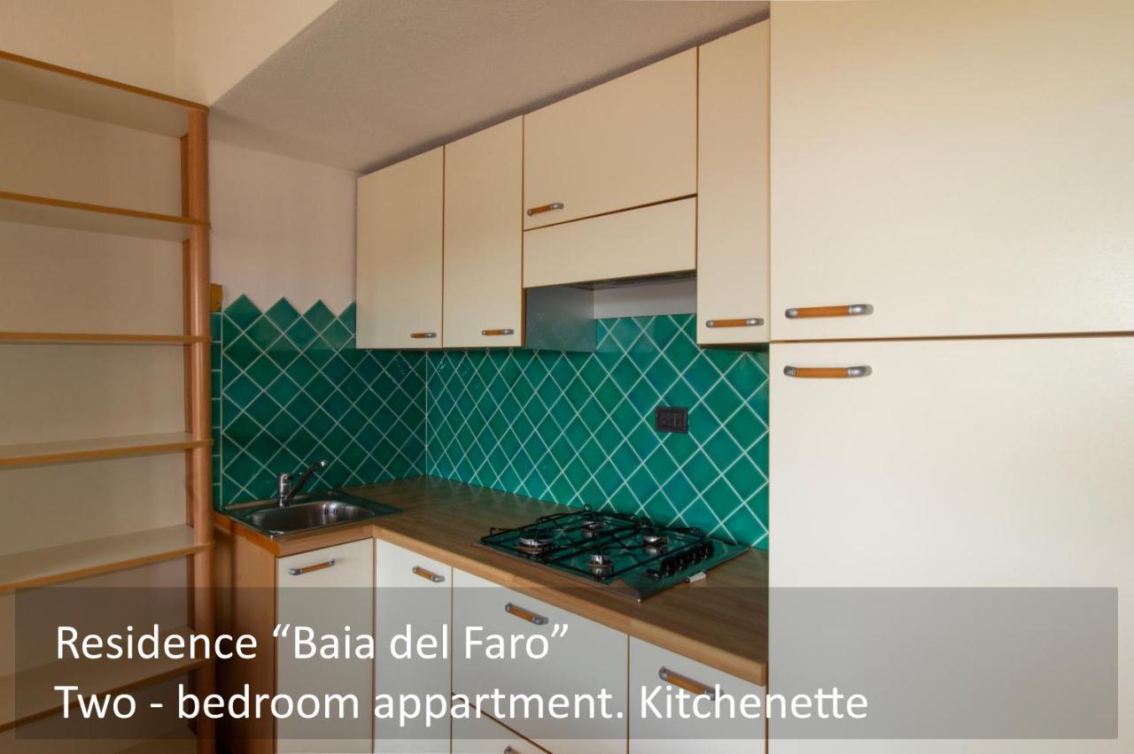 Baia Del Faro Aparthotel Palau Bagian luar foto