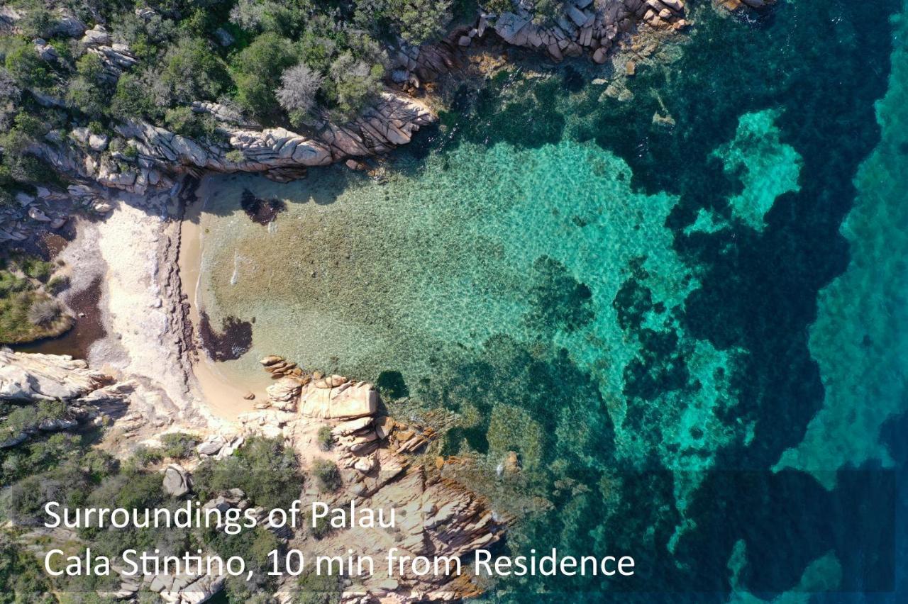 Baia Del Faro Aparthotel Palau Bagian luar foto