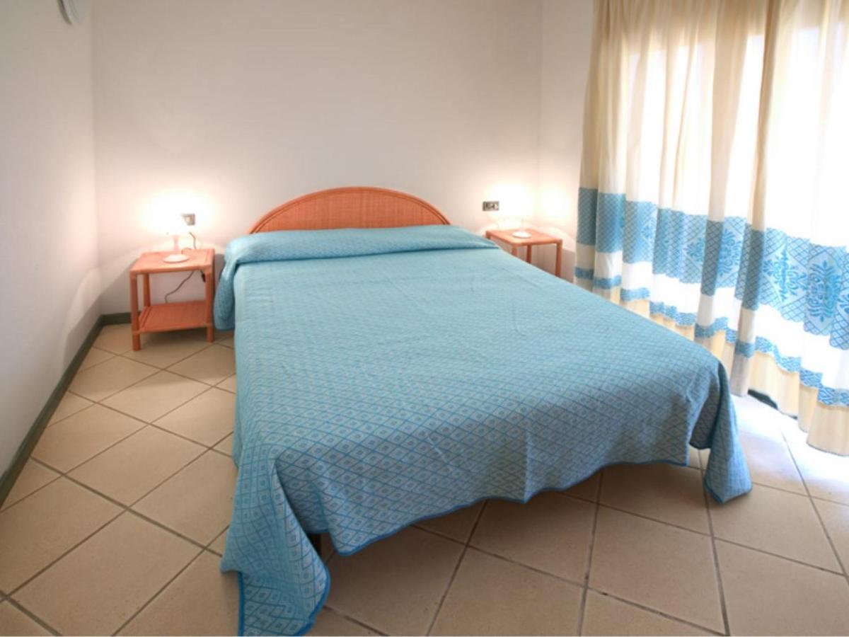Baia Del Faro Aparthotel Palau Bagian luar foto