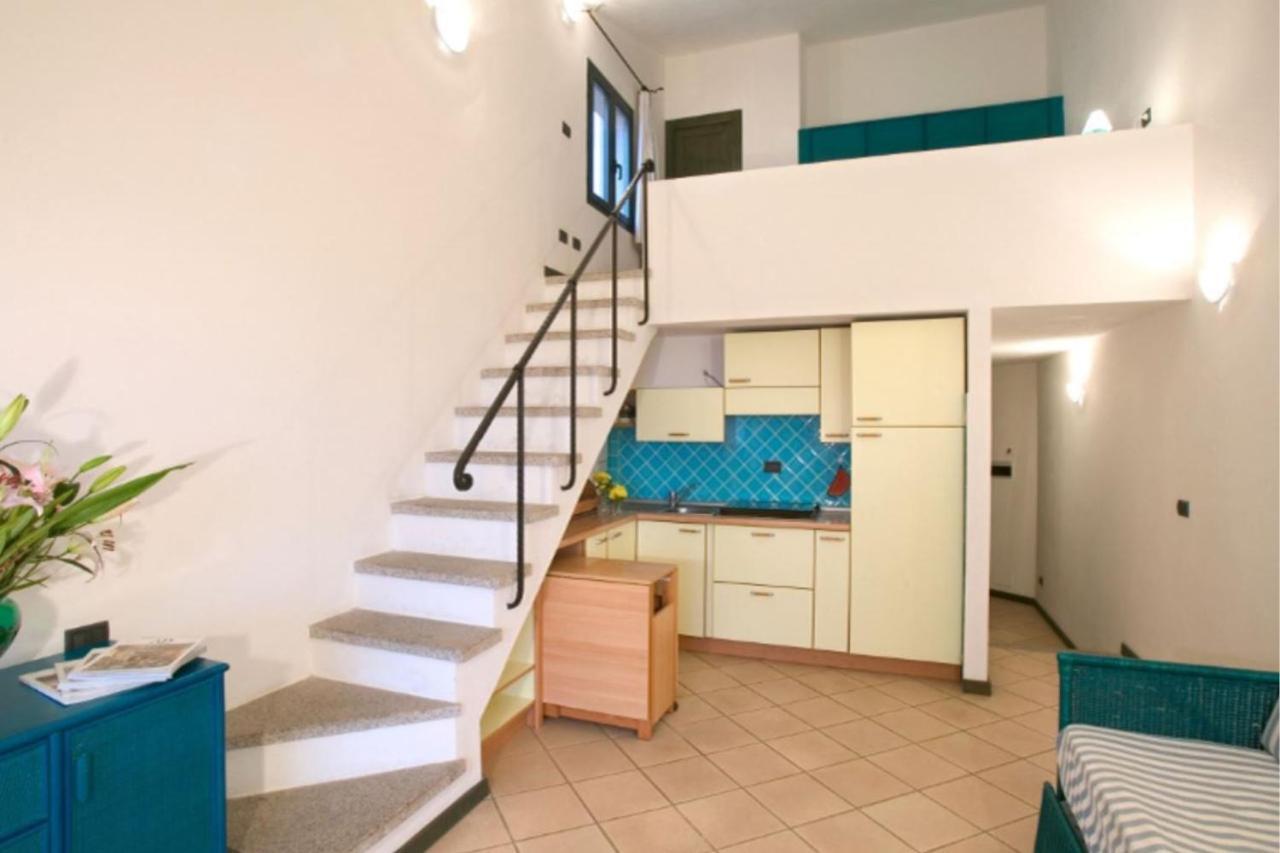 Baia Del Faro Aparthotel Palau Bagian luar foto