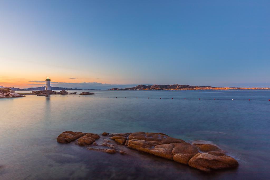 Baia Del Faro Aparthotel Palau Bagian luar foto