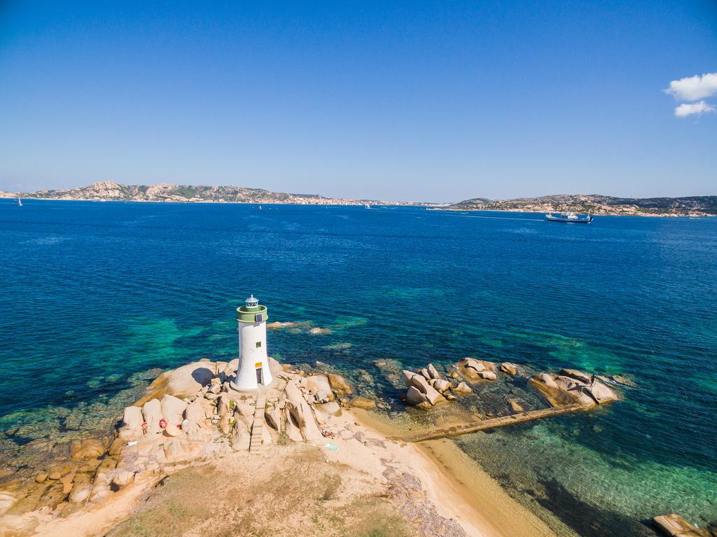 Baia Del Faro Aparthotel Palau Bagian luar foto